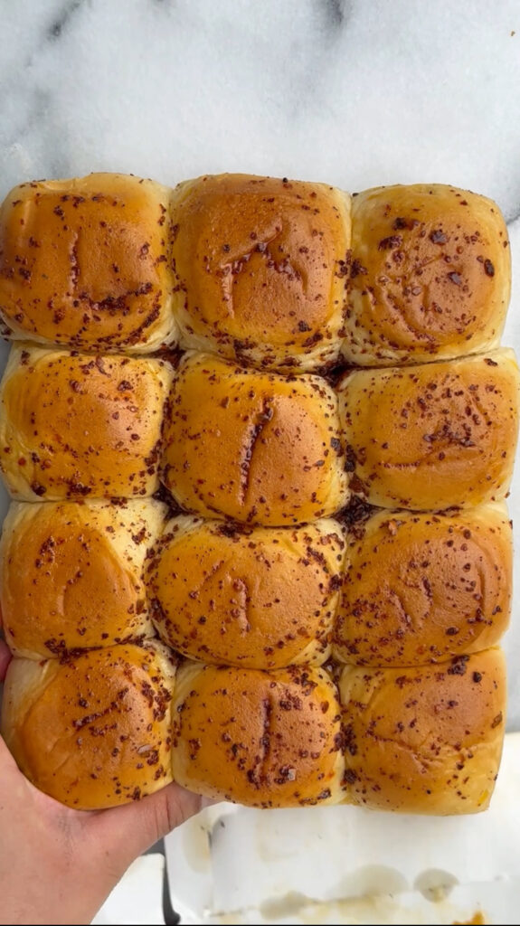dinner rolls brushed with oil and spices