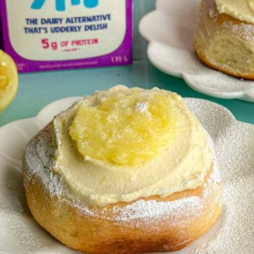 lemon sweet rolls similar to cinnamon rolls topped with cream cheese frosting and lemon curd